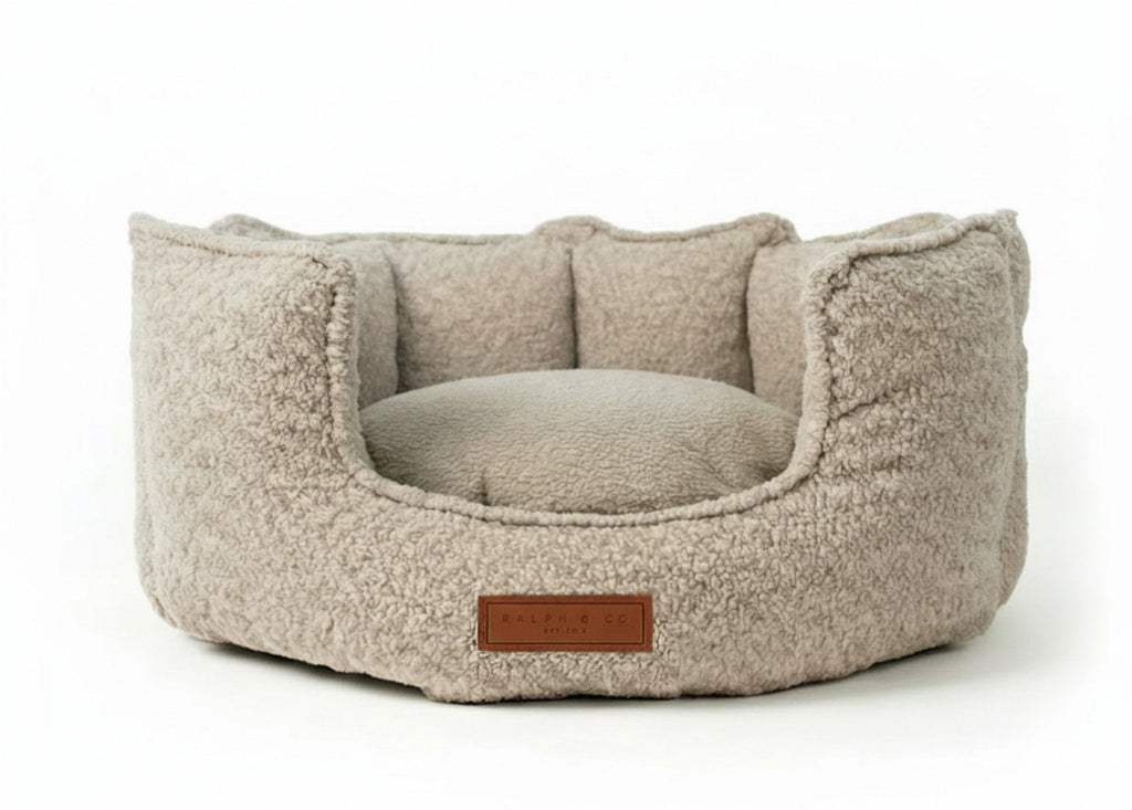 The Cotswold oatmeal bouclé high-wall dog bed